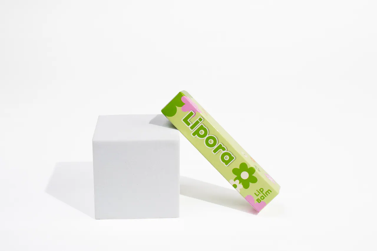 รูปตัวอย่างกล่องเครื่องสำอาง Lipora Lip Balm สำหรับรับผลิตกล่อง รับทำกล่อง และผลิตกล่องโดย Box Corner Art มุมหลัก