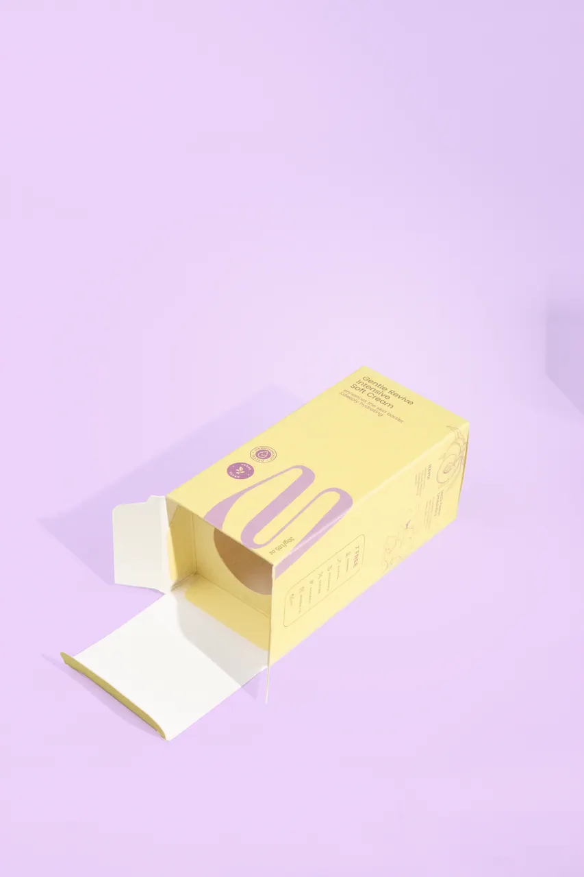 รูปตัวอย่างกล่องครีมสกินแคร์ Soft Cream โทนม่วงเหลือง สำหรับรับผลิตกล่อง รับทำกล่อง และผลิตกล่องโดย Box Corner Art มุมที่ 4