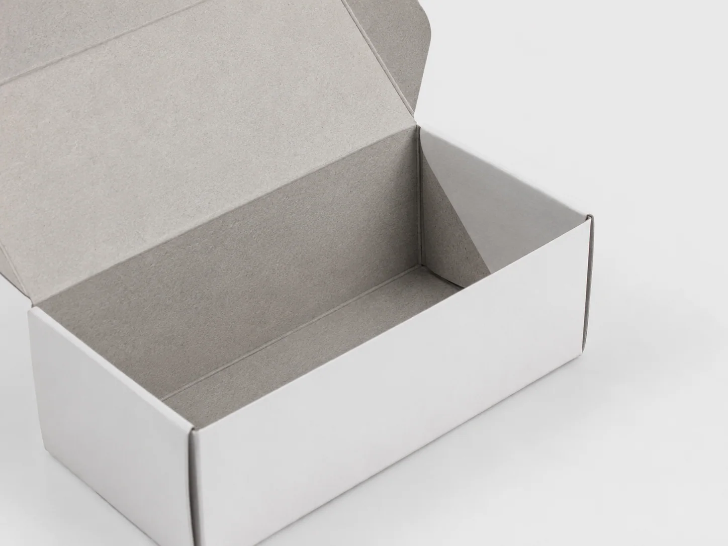 กระดาษหลังขาวช่วยให้กล่องดูสะอาดและพรีเมียมขึ้นอย่างไร โดย Box Corner Art